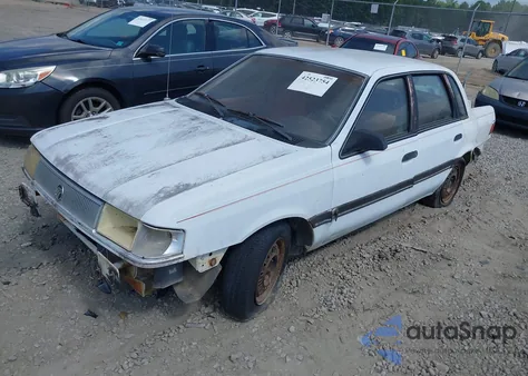 1989 Mercury Topaz Ls z USA, uszkodzony, nr VIN 1MECM37X6KK612988